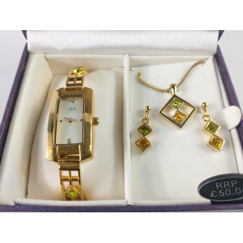 231 - A boxed SPIRIT OF CHARLES RENNIE MACKINTOSH watch with a pendant necklace and matching earrings (RRP... 