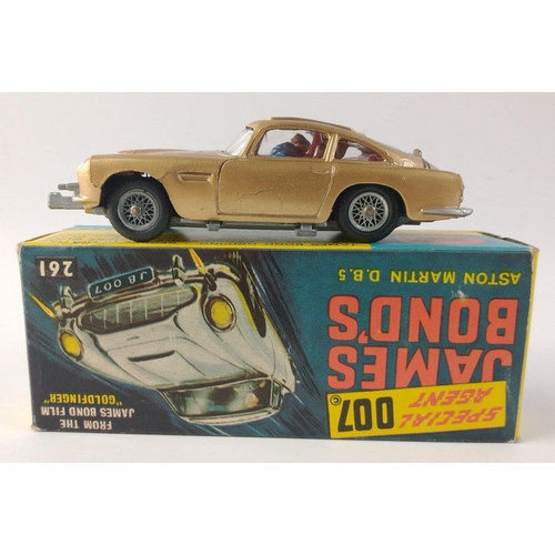 251 - Corgi Toys Diecast 261 JAMES BOND 007 ASTON MARTIN DB5 in original display box.  Complete with baddi... 