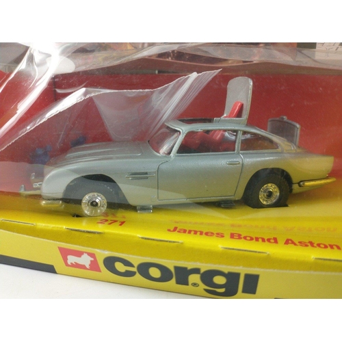 301 - CORGI James Bond 271 Aston Martin DB5 in box. Wear and damage to box in particular the see through p... 