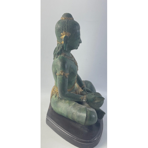 364 - A lovely heavy cast metal drumming oriental Buddah on plinth.  Standing 30cm high approx this is a v... 