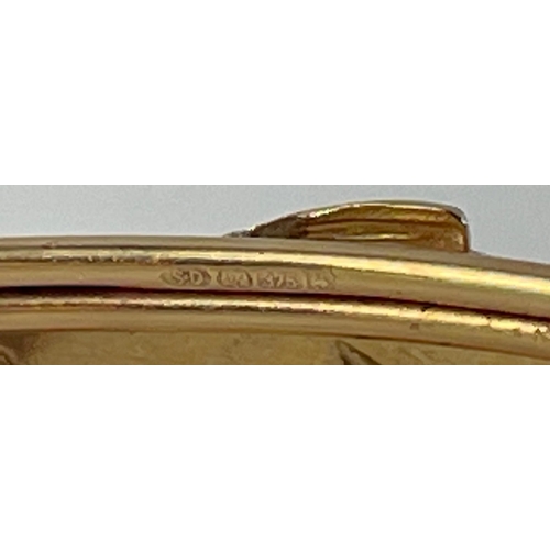 76 - A very attractive 375 gold fully hallmarked bangle with a whale motif.  6.3g gross weight.  A very s... 