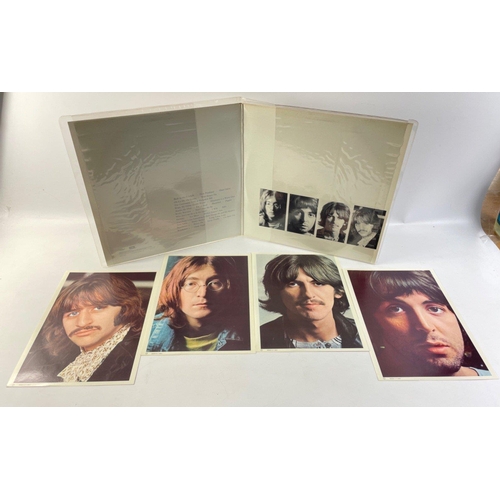 12 - THE BEATLES. A pair of well looked after original BEATLES vinyl LPs, The White Album SEBX-11841 on C... 