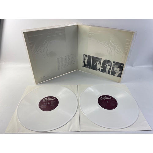 12 - THE BEATLES. A pair of well looked after original BEATLES vinyl LPs, The White Album SEBX-11841 on C... 