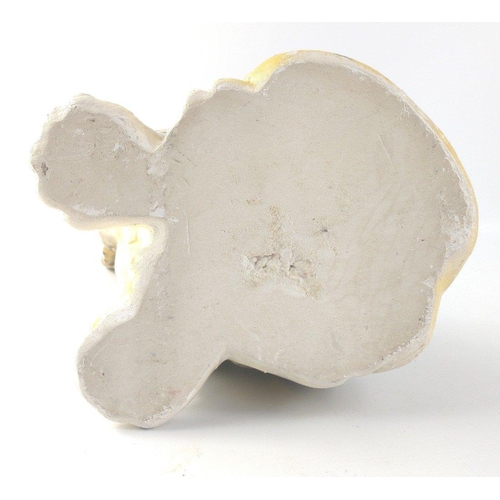 139 - A plaster leopard cub standing approx 25cm high.  A few chips missing from the surface but still a c... 