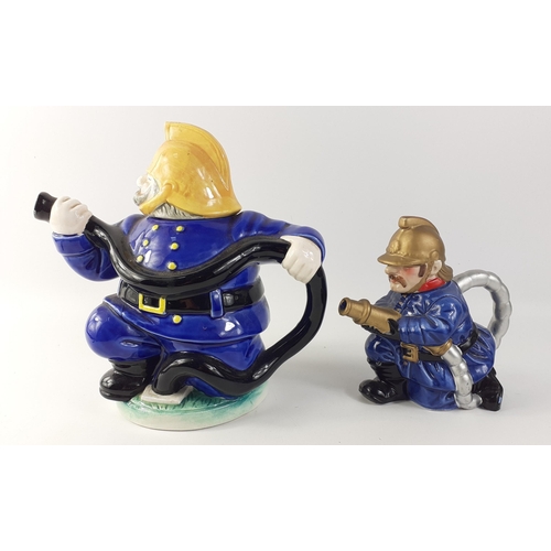 144 - Two collectable fireman teapots. Larger approx 20cm tall, other 14cm tall approx#144