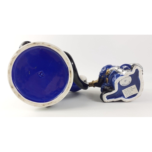 144 - Two collectable fireman teapots. Larger approx 20cm tall, other 14cm tall approx#144