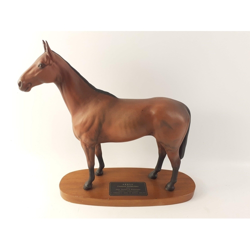 157 - BESWICK RACE HORSE - ARKLE. A Connoisseur Model by Beswick England on a wooden plinth. 30cm high app... 