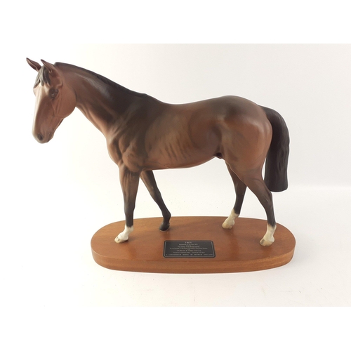 158 - BESWICK RACE HORSE - TROY. A Connoisseur Model by Beswick England on a wooden plinth. 28cm high appr... 