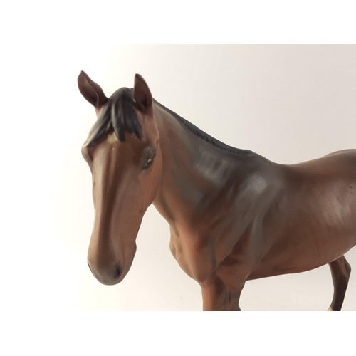 158 - BESWICK RACE HORSE - TROY. A Connoisseur Model by Beswick England on a wooden plinth. 28cm high appr... 