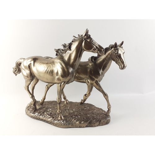 159 - A beautiful and striking large resin horse model showing two gorgeous steeds with flowing manes and ... 
