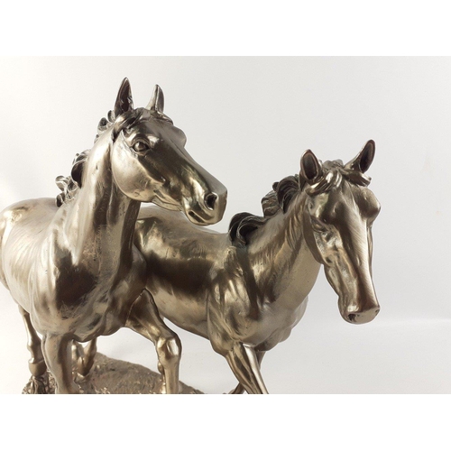 159 - A beautiful and striking large resin horse model showing two gorgeous steeds with flowing manes and ... 