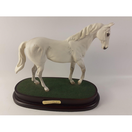 162 - BESWICK RACE HORSE - DESERT ORCHID. A Connoisseur Model by Beswick England on a wooden plinth. 23cm ... 