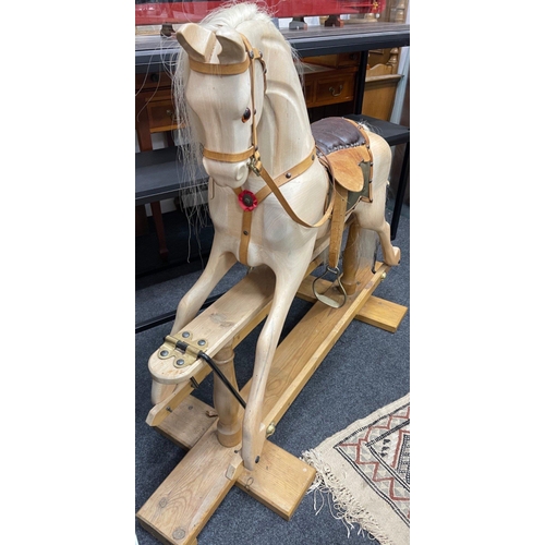 171A - A SUBSTANTIAL handmade rocking horse with real horse hair mane and leather saddle - this is a solid ... 