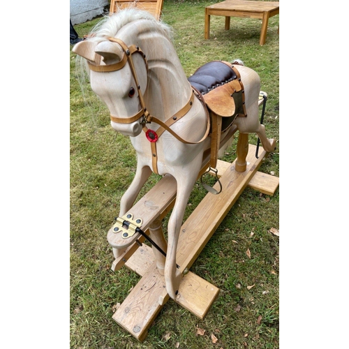 171A - A SUBSTANTIAL handmade rocking horse with real horse hair mane and leather saddle - this is a solid ... 