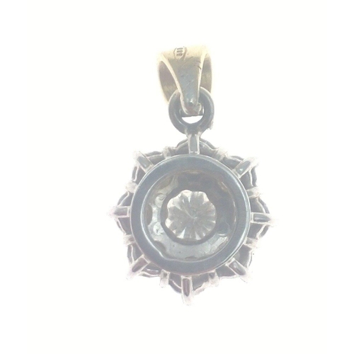 11 - A beautiful diamond (tested) pendant on a 585 stamped lsuspensionring.  The pendant 1cm wide consist... 