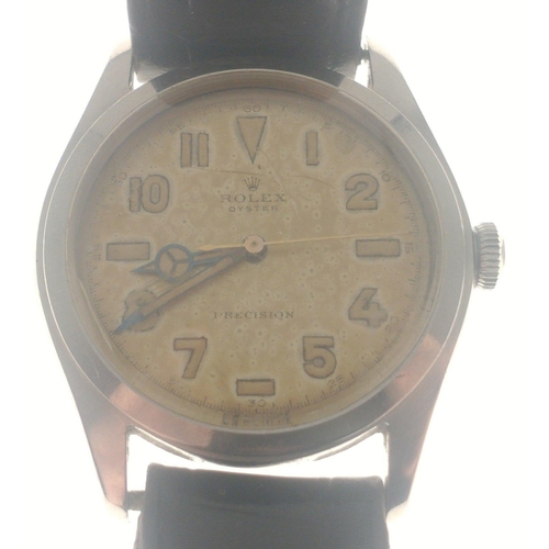 19 - ITS JUST GOT TO BE ROLEX! 
A vintage ROLEX mid-size Oyster watch on a leather strap with original 'R... 