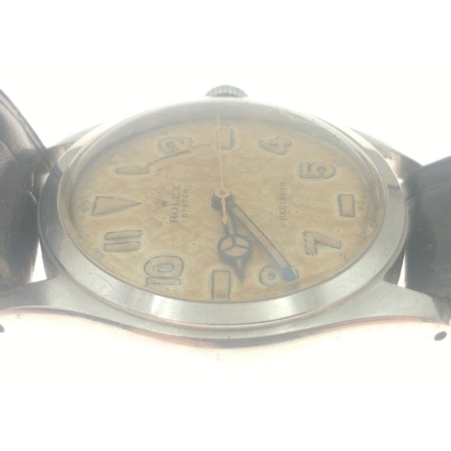 19 - ITS JUST GOT TO BE ROLEX! 
A vintage ROLEX mid-size Oyster watch on a leather strap with original 'R... 