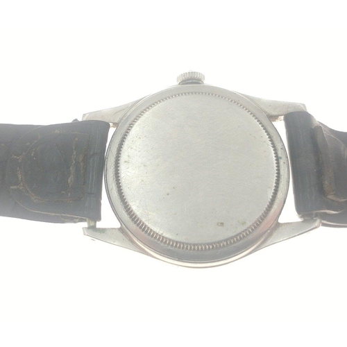 19 - ITS JUST GOT TO BE ROLEX! 
A vintage ROLEX mid-size Oyster watch on a leather strap with original 'R... 