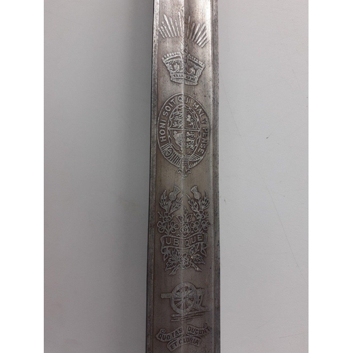 205 - A 19th century ceremonial dress sword with good chased design and ROYAL ARTILLERY on one side and re... 