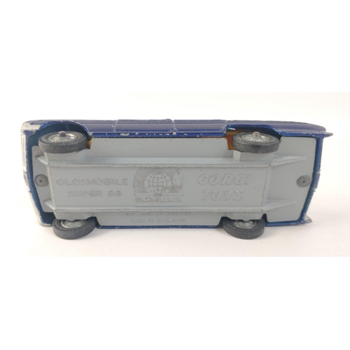 256 - A CORGI toys MAN FROM U.N.C.L.E. Oldsmobile super 88 diecast model in good condition, light play wea... 