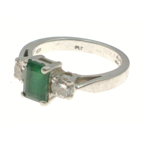 3 - PLATINUM hand-made ring with a stunning EMERALD 0.89ct flanked by two round brilliant cut diamonds a... 