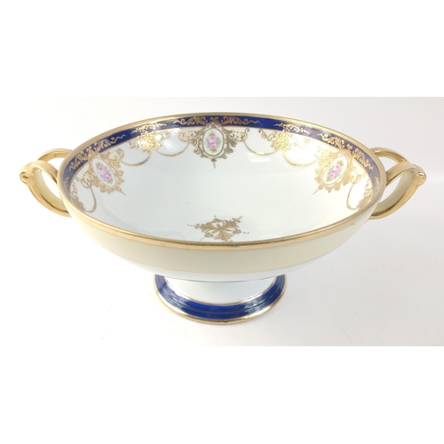 306 - An attractive porcelain bowl (23cm dia), with heavy gilt decoration on a pedestal standing 11cm tall... 