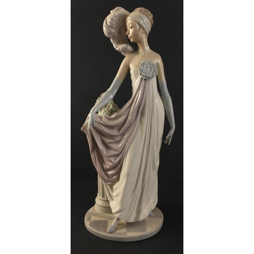 329 - A beautiful LLADRO 1920s female figurine in flowing gown standing next to classical column and vase ... 