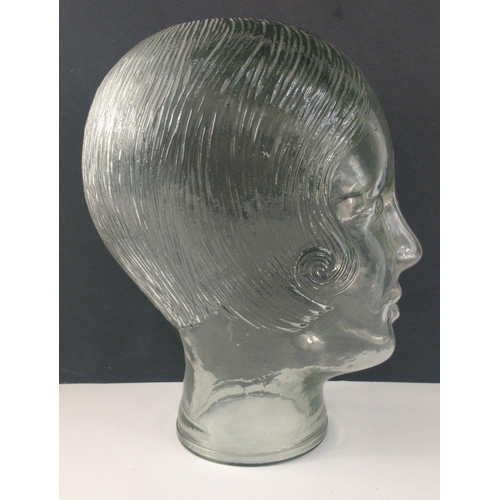 367 - A very unusual pressed glass head of an attractive young flapper like girl with a bob hair cut. Unus... 