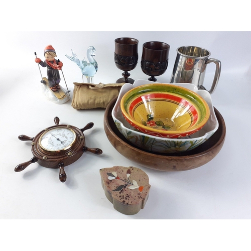 616 - A mixed lot of decorative items to include two African wooden goblets, a ship's wheel thermometer, a... 