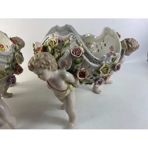 114 - EXQUISITE! 
A pair of SUBSTANTIAL SITZENDORF porcelain colourful bowls with standing CHERUB figures
... 
