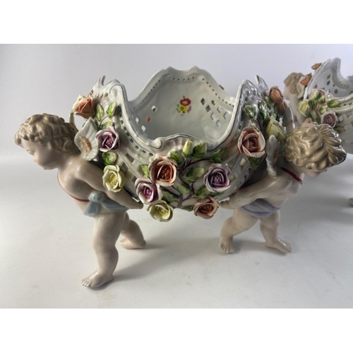 114 - EXQUISITE! 
A pair of SUBSTANTIAL SITZENDORF porcelain colourful bowls with standing CHERUB figures
... 