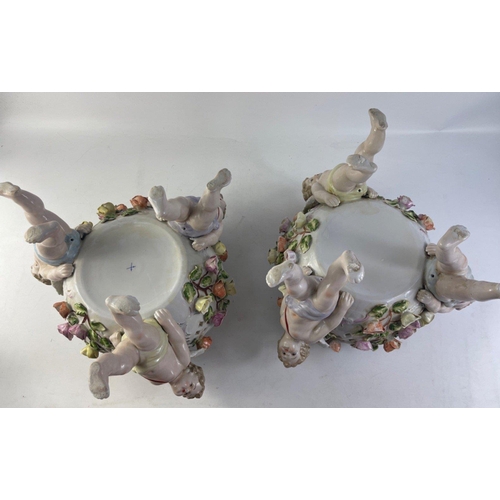 114 - EXQUISITE! 
A pair of SUBSTANTIAL SITZENDORF porcelain colourful bowls with standing CHERUB figures
... 