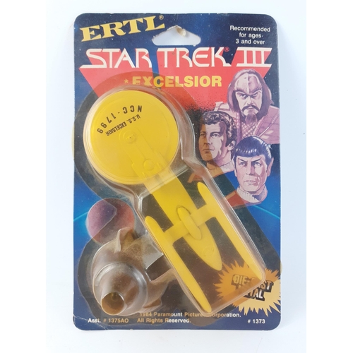 305 - ERTL Star Trek III Excelsior in blister pack from 1984.  Plastic yellowed.#64