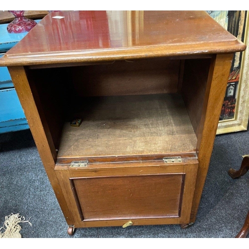 409 - An Edwardian bedside pot cupboard with original porcelain casters and drop down door.  Dimensions 21... 