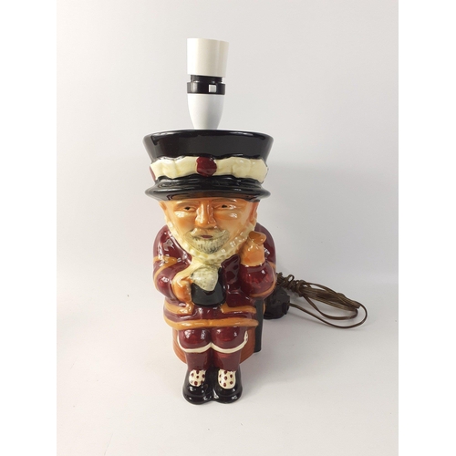 438 - A BEEFEATER modelled toby jug style character table lamp base.  Standing 30cm high.  No shade.#111... 