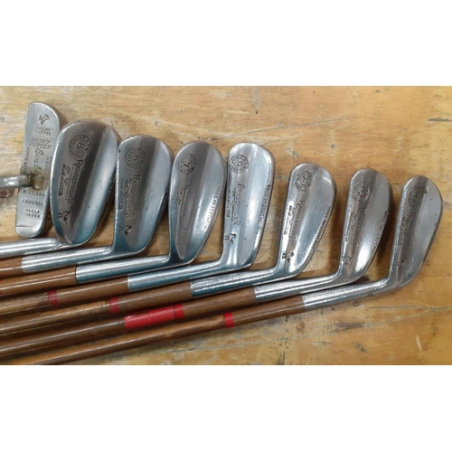 248 - A lot of 11 golf clubs to include 7 
