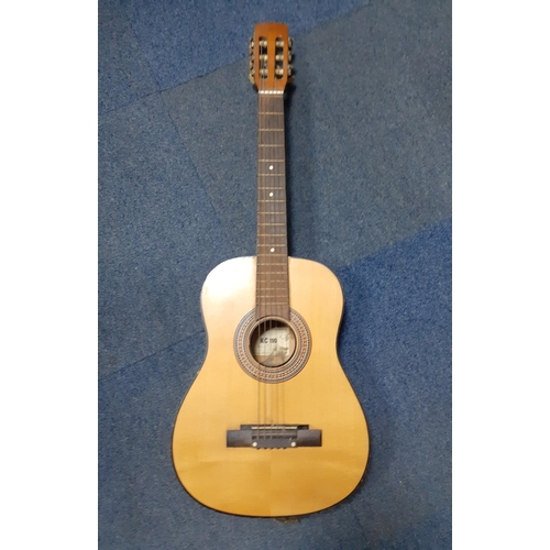 253 - An acoustic guitar with KC 110 label on interior#256