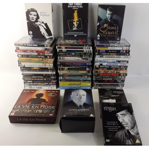 256 - A large quantity of mixed genre DVDs including Hitchcock- The Signature Collection, the James Stewar... 