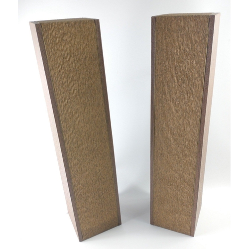 271 - A pair of discreet speakers in wood with bronze fabric centres which can be wall-mounted measuring 6... 