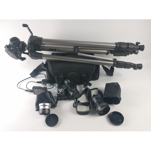 282 - A NIKON Colorpix 5700 camera in carry case with a SONY tele conversion lens x 2 VCL-R2052, and an MA... 