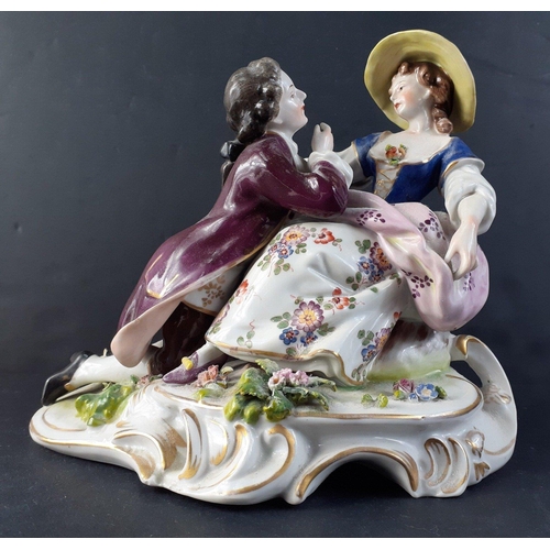171 - A German figurine group of a courting couple.  Attractive colourway and in generally good condition ... 