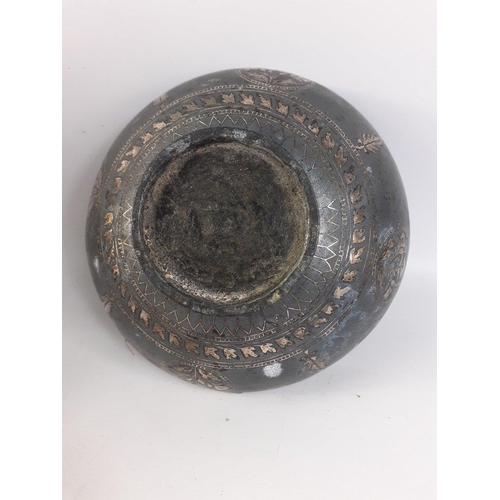 198 - An Indian BIDRI style lidded medicine bowl with silver inlay.  Measures 130mm diameter approx and st... 