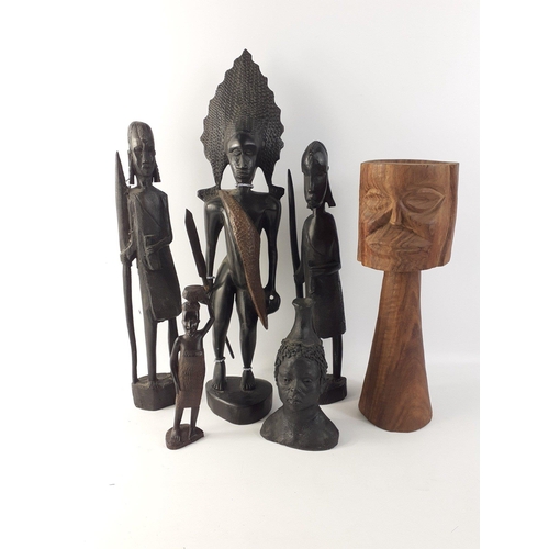 229 - A collection of African figures in wood.  Tallest stands 47cm tall.#50
