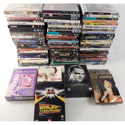 255 - A box of mixed-genre DVDs including the Pink Panther film collection, Back to the Future trilogy, Di... 