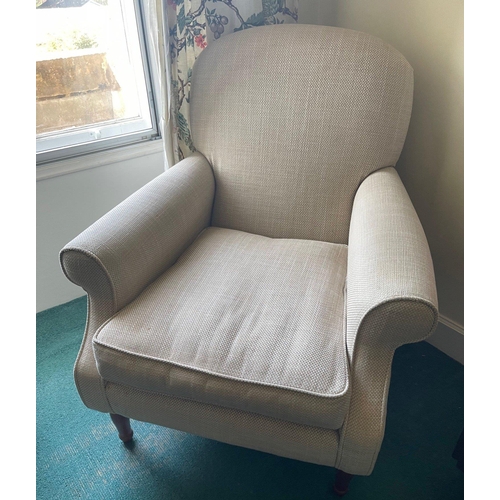 372 - A comfortable cream upholstered armchair#105