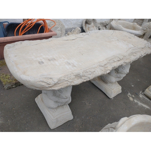 406 - A stonework garden bench on squirrel plinths with timber style seat 100cmW x 39D x 44H - brand new i... 