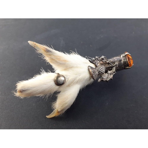 101 - VINTAGE SCOTTISH INTEREST! A mounted Ptarmigan Grouse claw with a Cairngorm in the end and an emboss... 