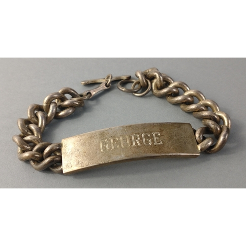 106 - A gents ID bracelet named GEORGE.  Hallmarks to rear of tag Sheffield 1978.  Total gross weight 67.5... 