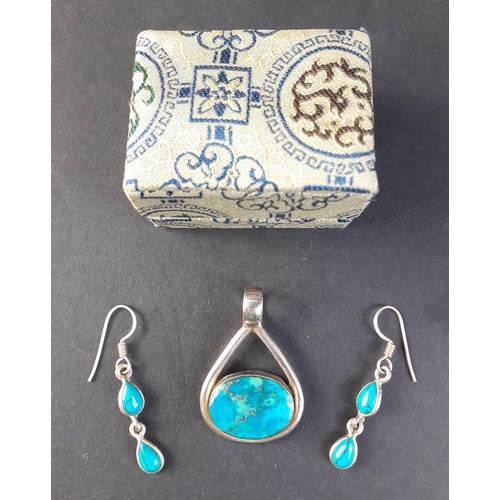 112 - LONDON JEWELLER vintage silver and blue/green stone pendant and matching earrings of the highest qua... 