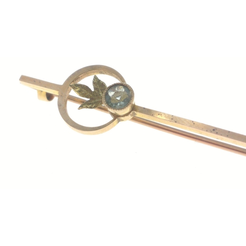 13 - A very attractive 15ct marked bar brooch with light blue stone in the centre.  Total gross weight 3.... 